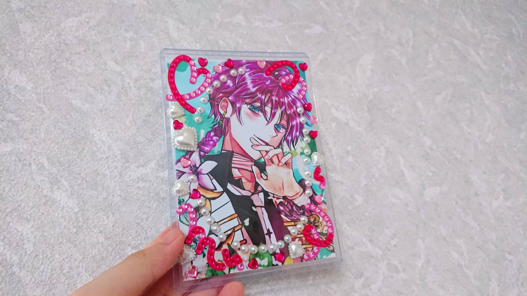 Complete by sticking a sticker on the hard card case