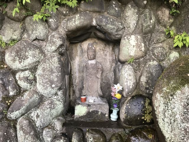 Kannon statue on the wall of Torinji Temple